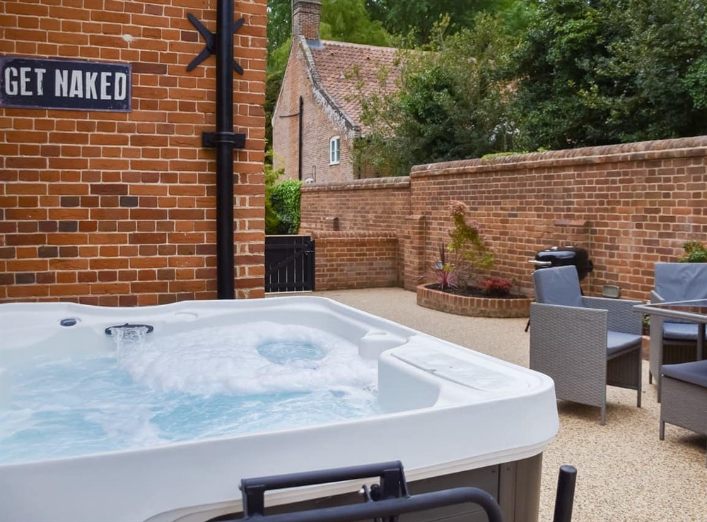 Hot tub at The Stables in Dunston, Norfolk