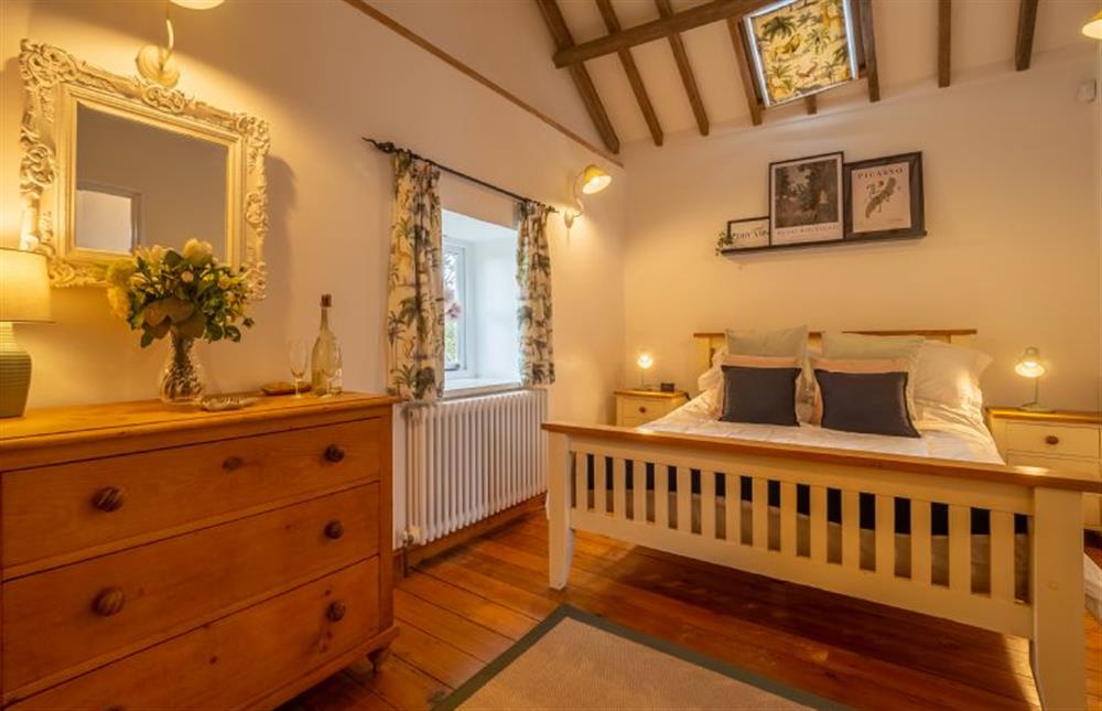 Bedroom with a double bed at The Stables, Edingthorpe near North Walsham