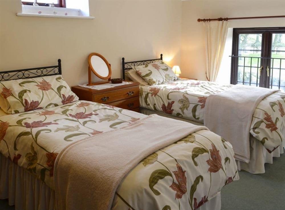Twin bedroom at The Stables in Glanvilles Wootton, Sherborne., Dorset