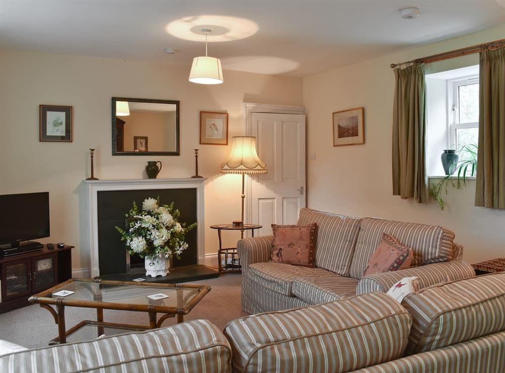 Cosy living room at The Stables in Harburn, near West Calder, West Lothian