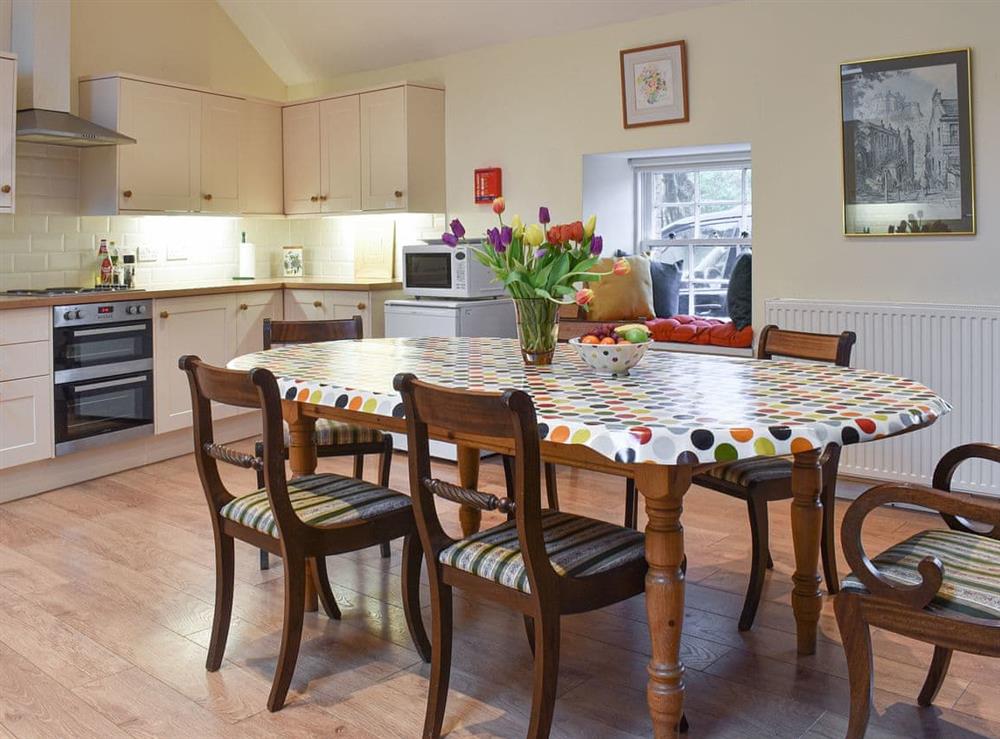 Country style kitchen with breakfast area (photo 2) at The Stables in Harburn, near West Calder, West Lothian