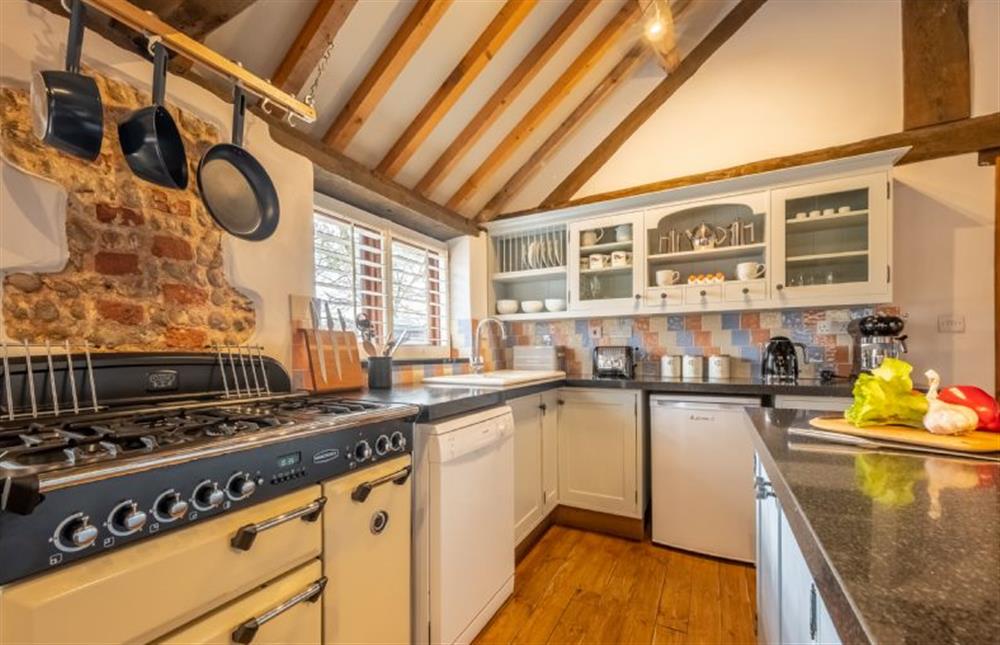 Kitchen with electric Range oven and gas hob at The Stables, High Kelling near Holt