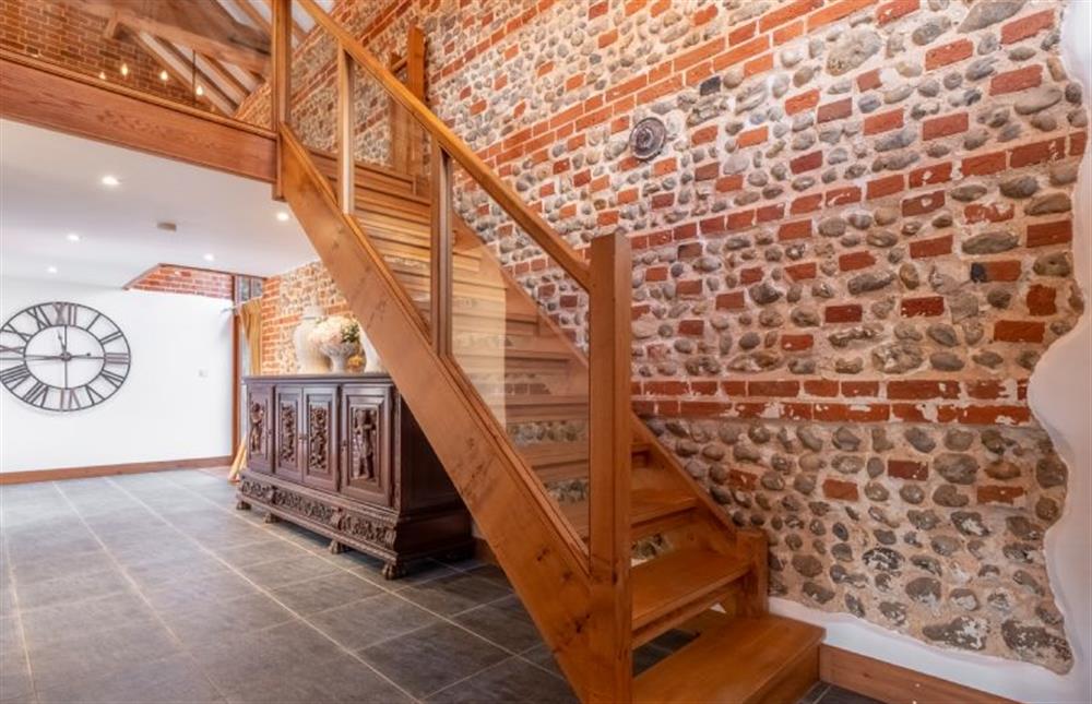 Open staircase to the first floor at The Stables, High Kelling near Holt