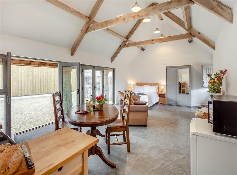 Open plan living space (photo 3) at The Stables in Kingscote, Gloucestershire