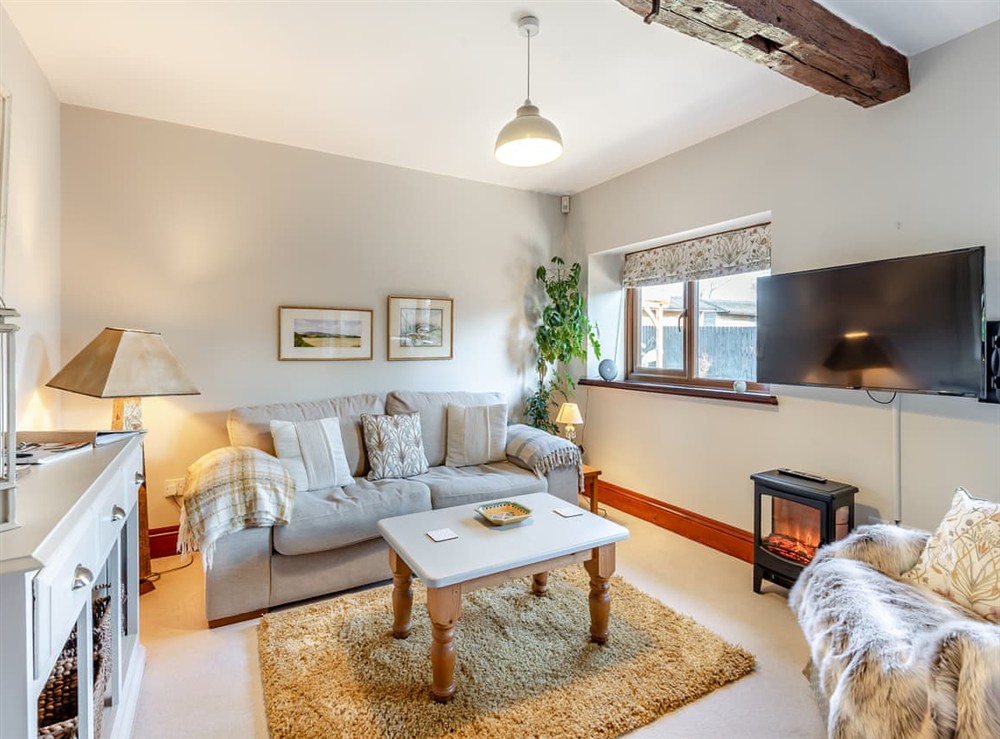 Living room at The Stables in Lugg Bridge, near Hereford, Herefordshire