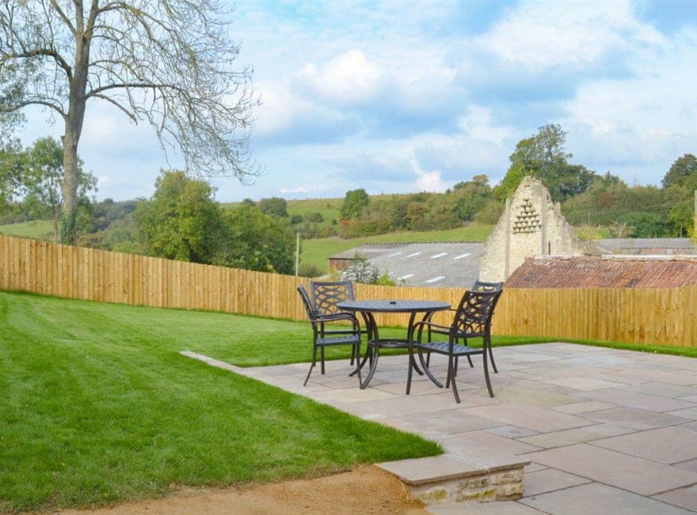 Garden and patio area at The Stables in Marksbury, near Bath, Avon