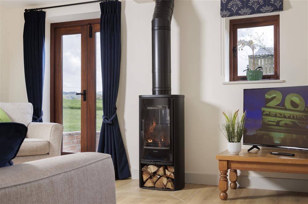 Wood burning stove in the sitting room for cooler evenings