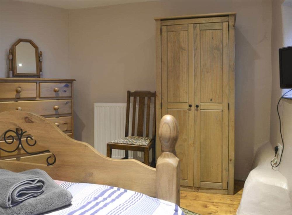 Ample storage and dressing area within double bedroom at The Stables in near Criccieth, Gwynedd