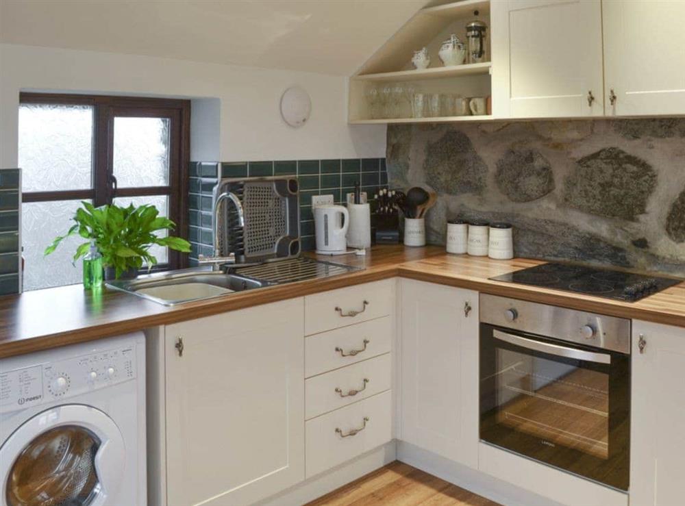 Well-equipped fitted kitchen at The Stables in near Criccieth, Gwynedd