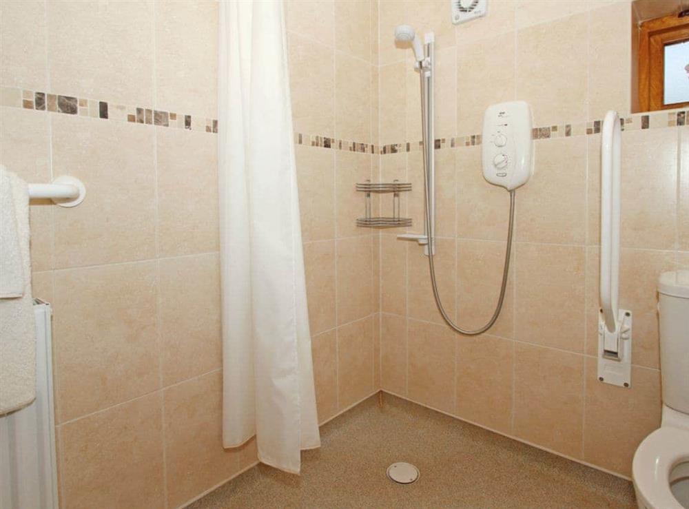 Fully tiled wet-room and WC