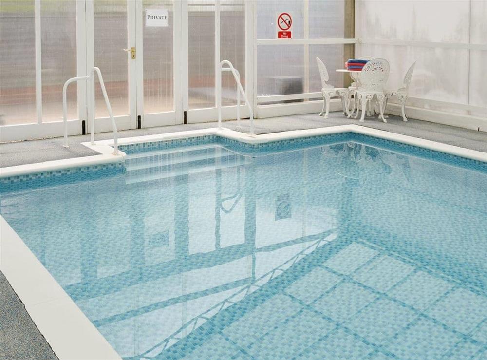 Indoor heated swimming pool at The Stables in Occold, Nr Eye, Suffolk., Great Britain