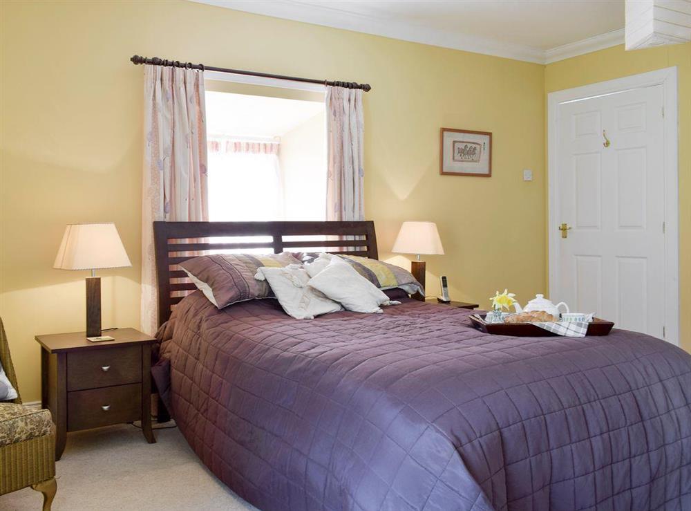 Comfortable master bedroom at The Stables in Pitcairlie, near St Andrews, Fife