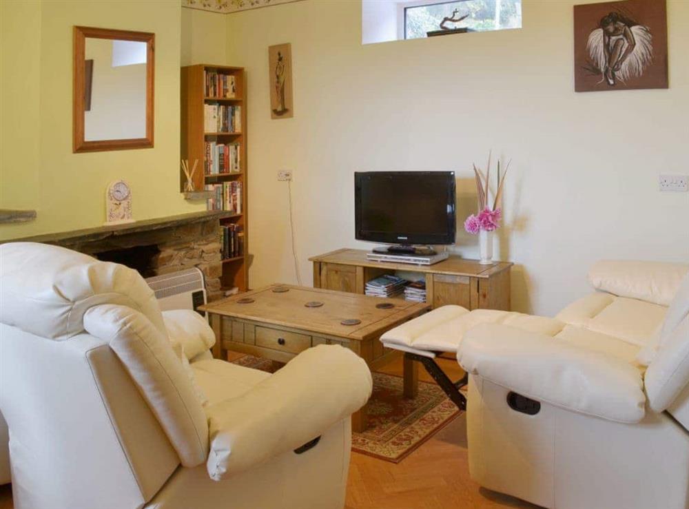 Comfortable living room/dining room at The Stables in Rezare, near Launceston, Cornwall