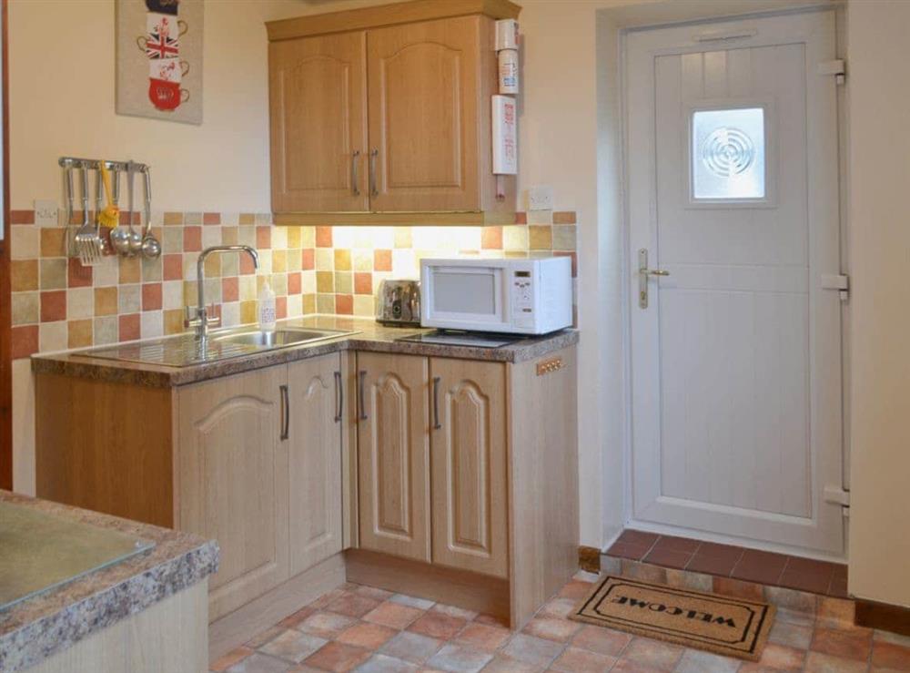 Stylish farmhouse style kitchen at The Stables in Rezare, near Launceston, Cornwall