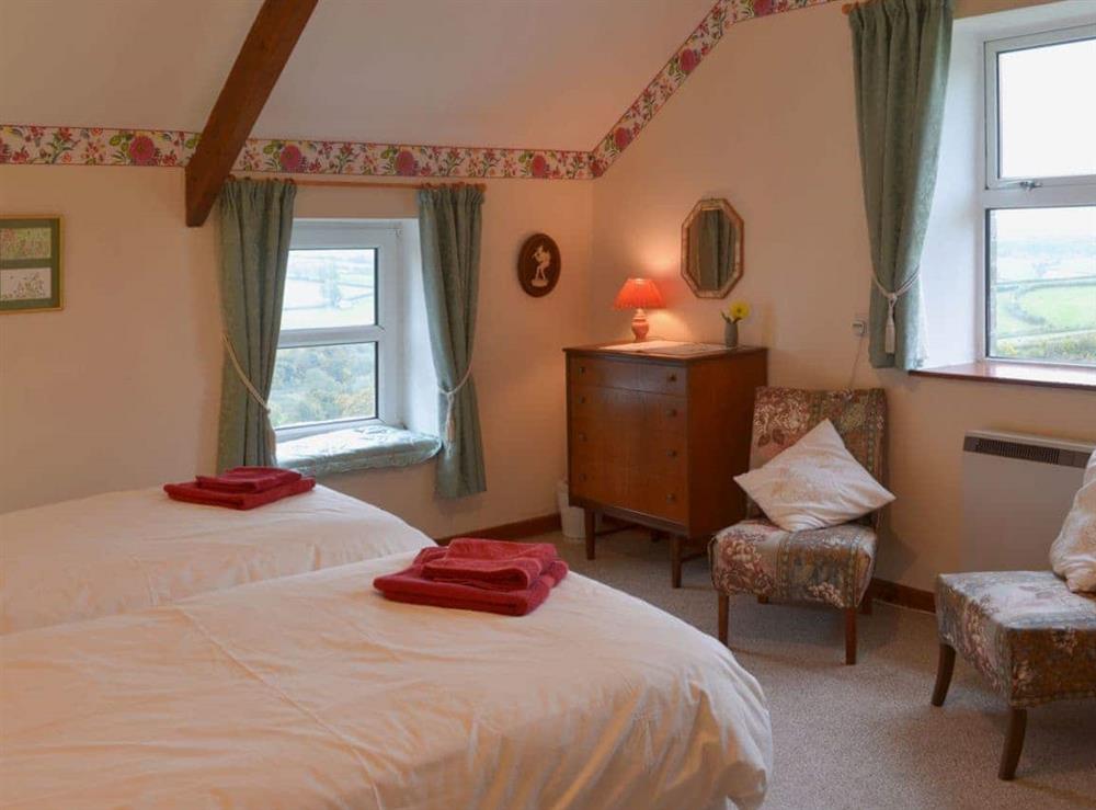 Twin bedroom with lovely views at The Stables in Rezare, near Launceston, Cornwall