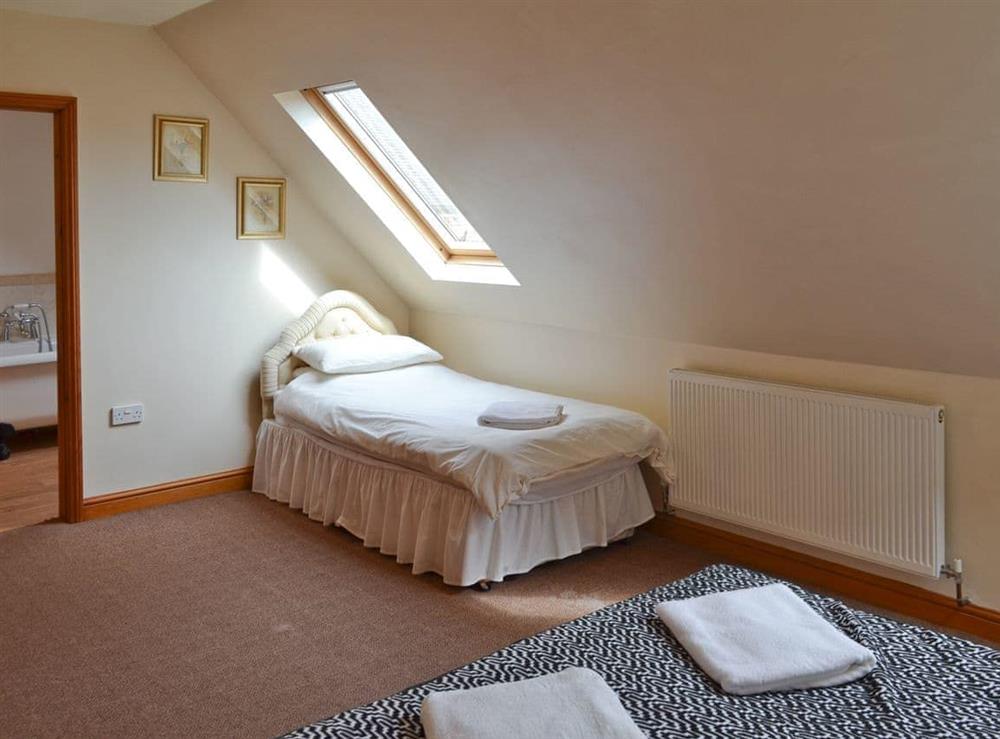 Double bedroom with additional single at The Stables in Somersal Herbert, near Ashbourne, Derbyshire