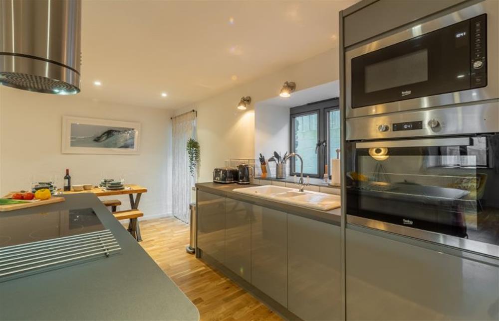 The Stables, St Agnes. Fully equipped kitchen with high gloss units at The Stables, St Agnes 