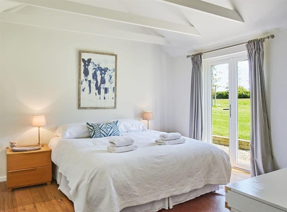 Light and airy double bedroom at The Stables, 