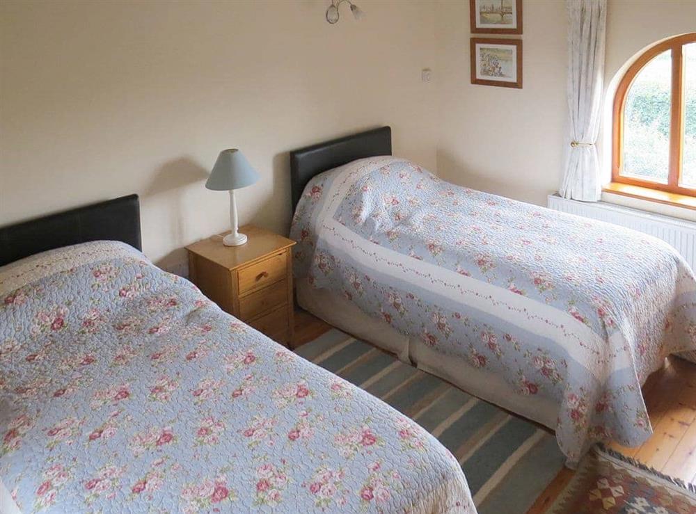 Welcoming twin bedroom at The Stables in Thrigby, Great Yarmouth, Norfolk., Great Britain
