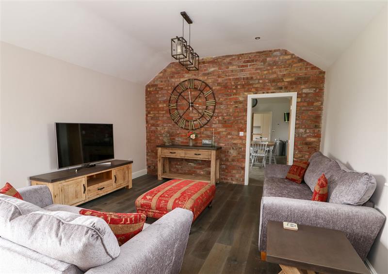 Relax in the living area at The Stables, Wrangle near Old Leake