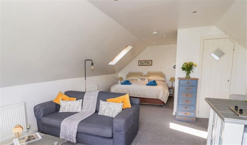 Relax in the living area at The Stilehouse Apartment, Bewdley