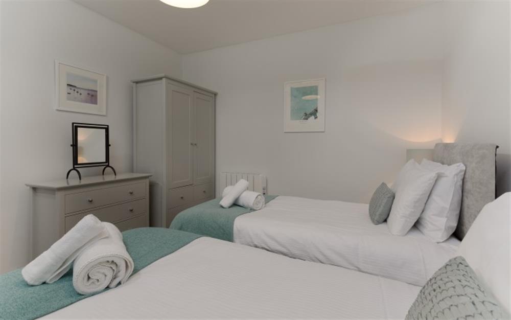 The beds in the second bedroom can be made up as twins or a super king. Please let us know which you'd prefer. at The Strand in Helford Passage