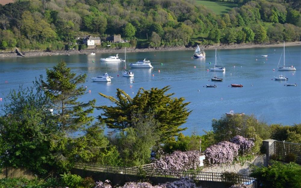 The boats on the Helford Passage are reminiscent of a scene from Swallows and Amazons. at The Strand in Helford Passage