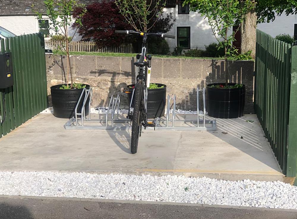 Bike rack with free electric car charger at The Strathspey Lodge in Grantown-on-Spey, Moray, Morayshire