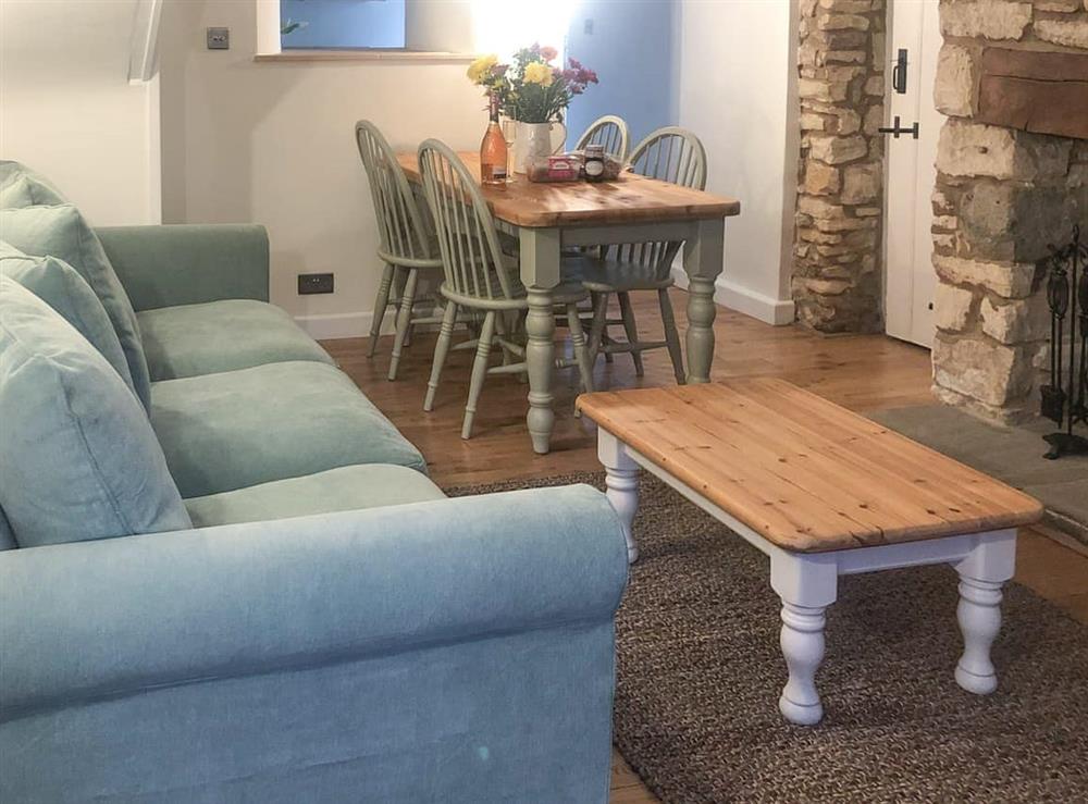 Living room/dining room at The Street Cottage in Uley, near Dursley, Gloucestershire