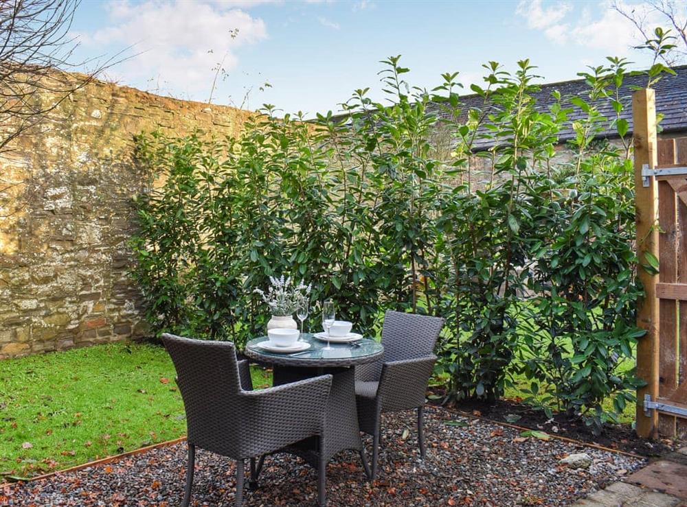 Outdoor eating area at The Studio At Cross House in Carnforth, Lancashire