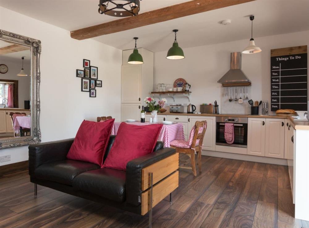 Open plan living space with wood burner (photo 3) at The Studio Barn @ Silverwood in Woolaston, near Lydney, Gloucestershire