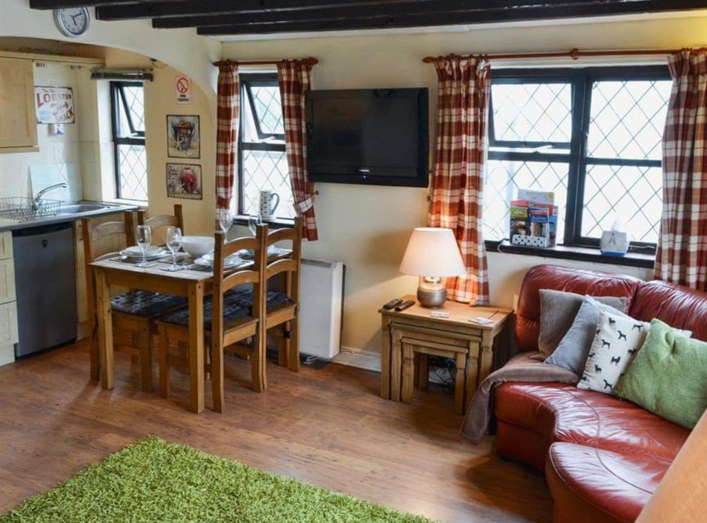Open plan living/dining room/kitchen at The Studio Cottage in Cemaes, near Holyhead, Gwynedd