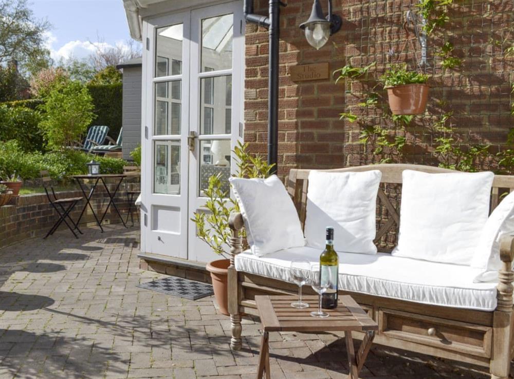 Tranquil sitting out area on patio at The Studio in Cuckfield, Sussex, West Sussex
