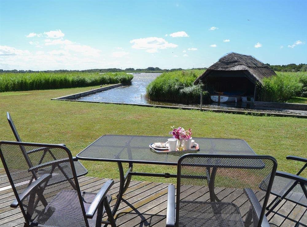 Peaceful seated area overlooking Hickling Broad at The Studio in Hickling, Norfolk., Great Britain