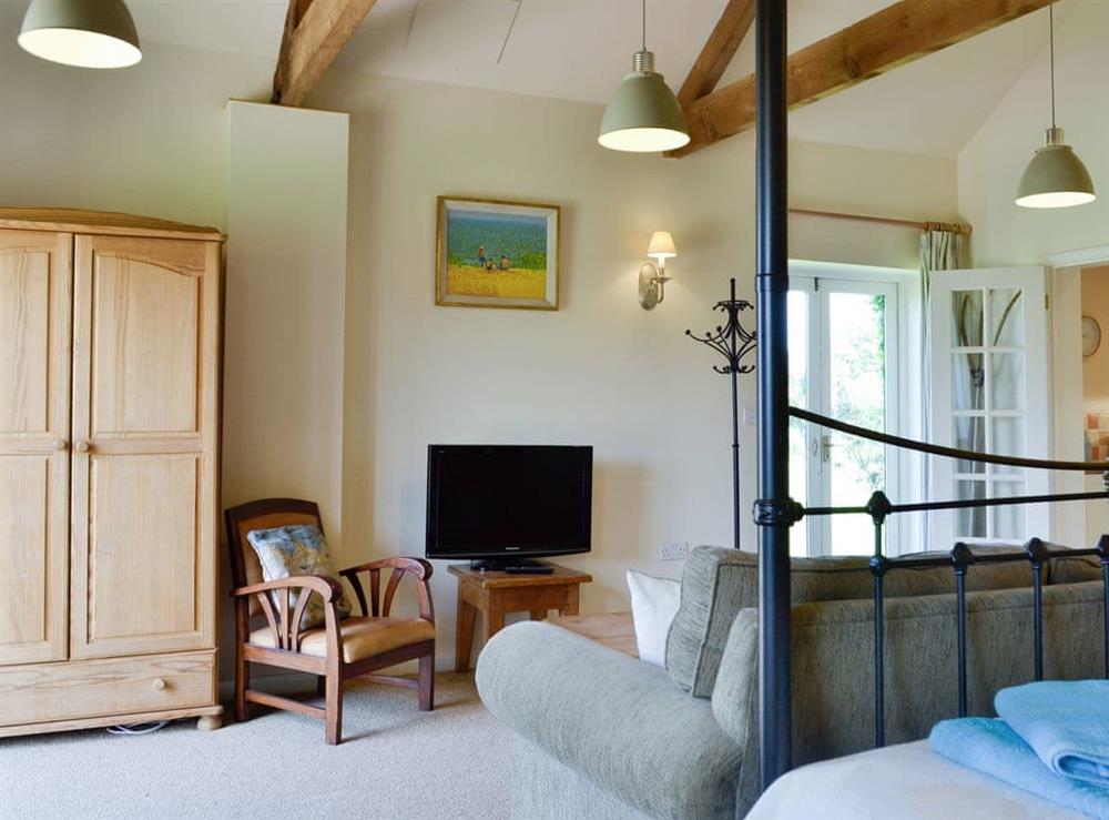 Centrally situated living area at The Studio in Hinton, near Saxmundham, Suffolk