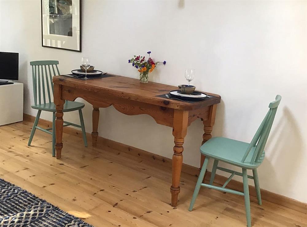 The dining table in the living area at The Studio in Hoe, near Dereham, Norfolk