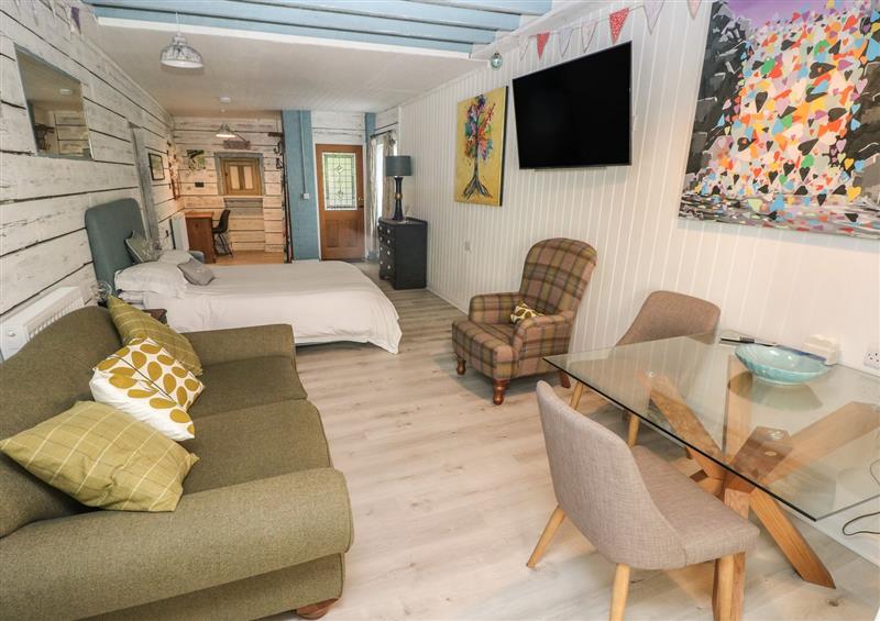 Relax in the living area at The Studio, Penally near Tenby
