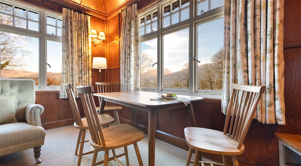 The dining table in the sitting room at The Summer House in Nr Hawkshead, Cumbria