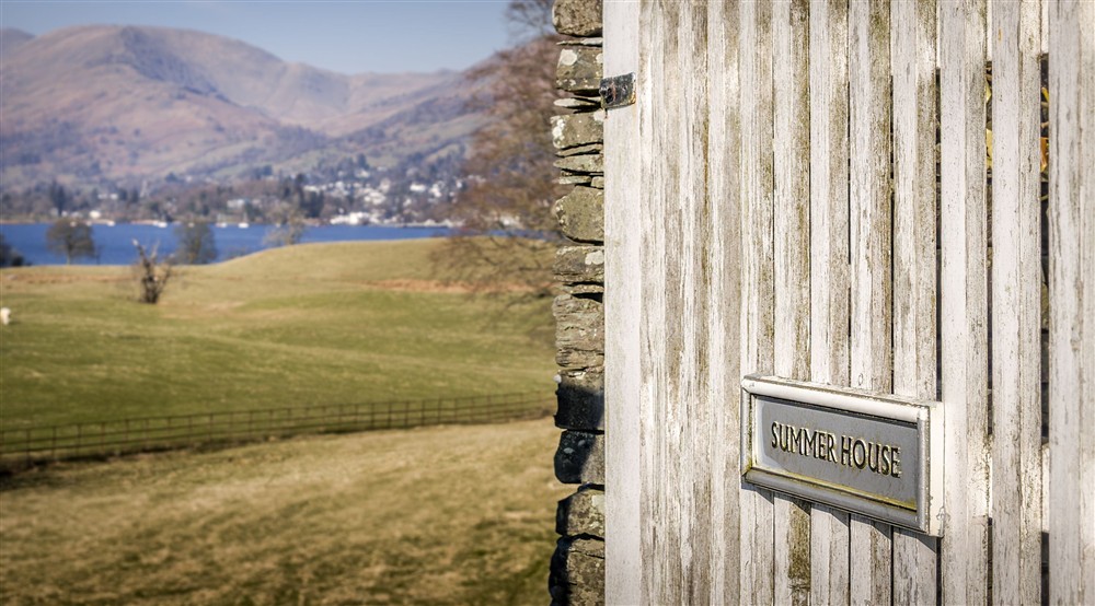 The gate to The Summer House, with Lake Windermere in the background, Cumbria at The Summer House in Nr Hawkshead, Cumbria