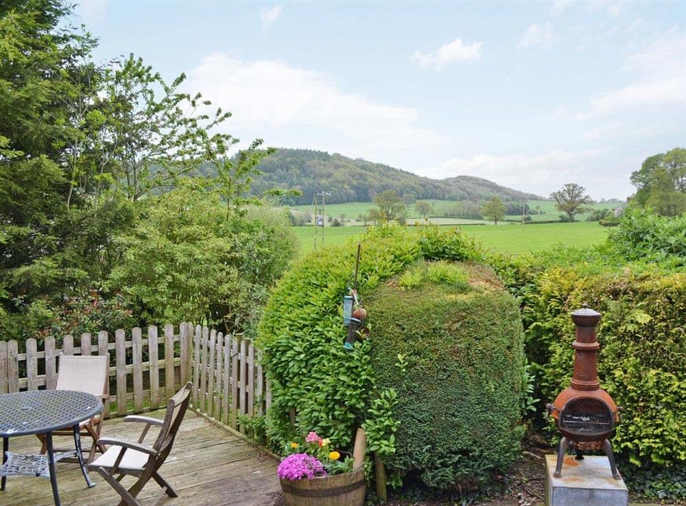 Peaceful sitting-out-area with wonderful views at The Summerhouse in Easthope, near Much Wenlock, Shropshire