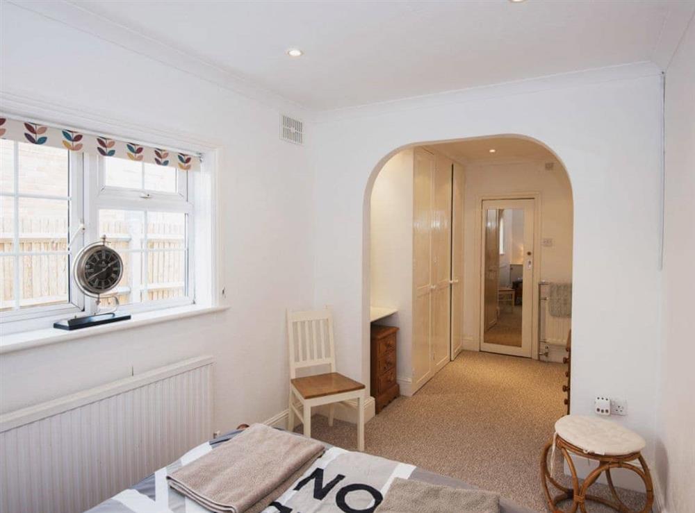 Double bedroom with stylish archway at The Swift in West Wittering, West Sussex