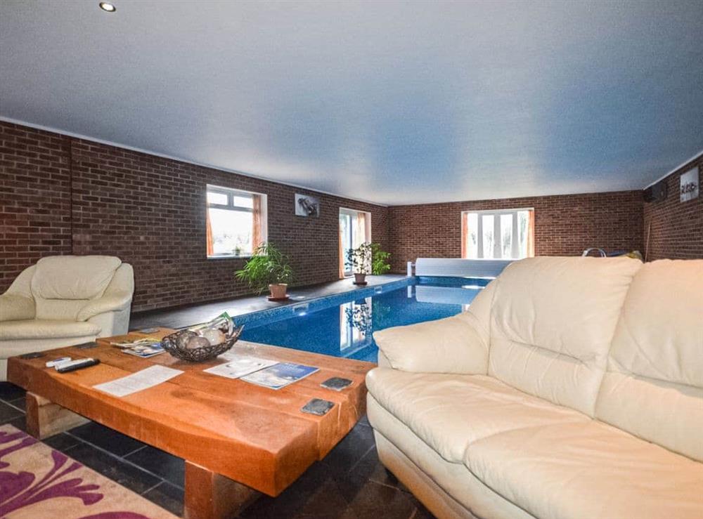 The living room at The Swimming Pool Retreat in Fontwell, West Sussex