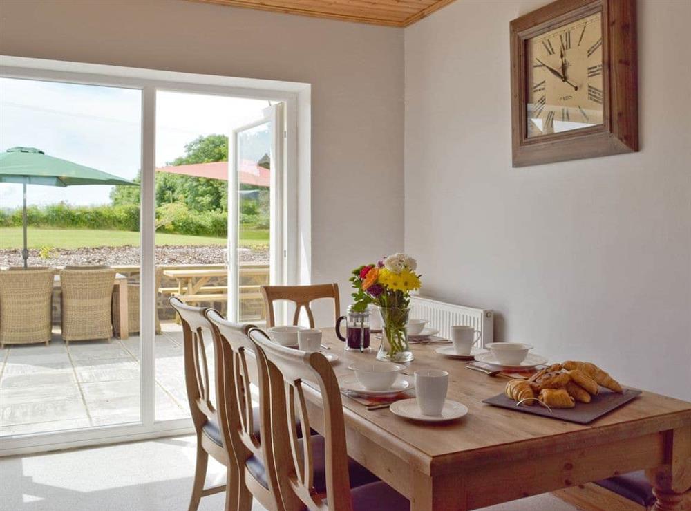 Airy kitchen/diner with door to patio at The Sycamores in Llawhaden, near Narberth, Dyfed
