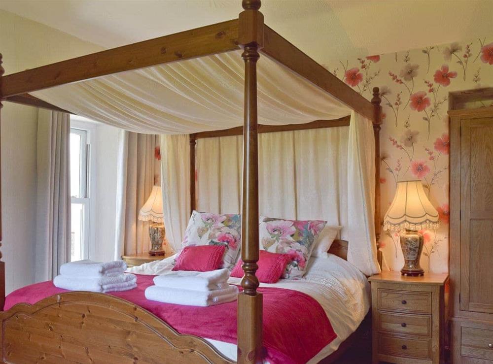 Elegant four poster bedroom at The Sycamores in Llawhaden, near Narberth, Dyfed