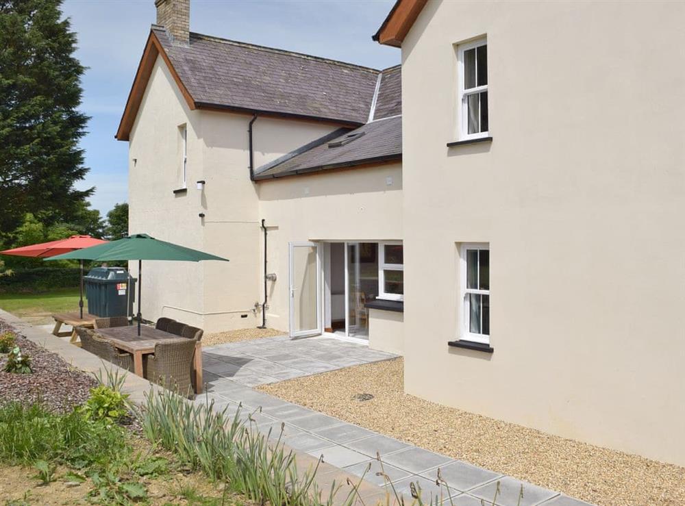 Patio to rear of property with outdoor furniture at The Sycamores in Llawhaden, near Narberth, Dyfed
