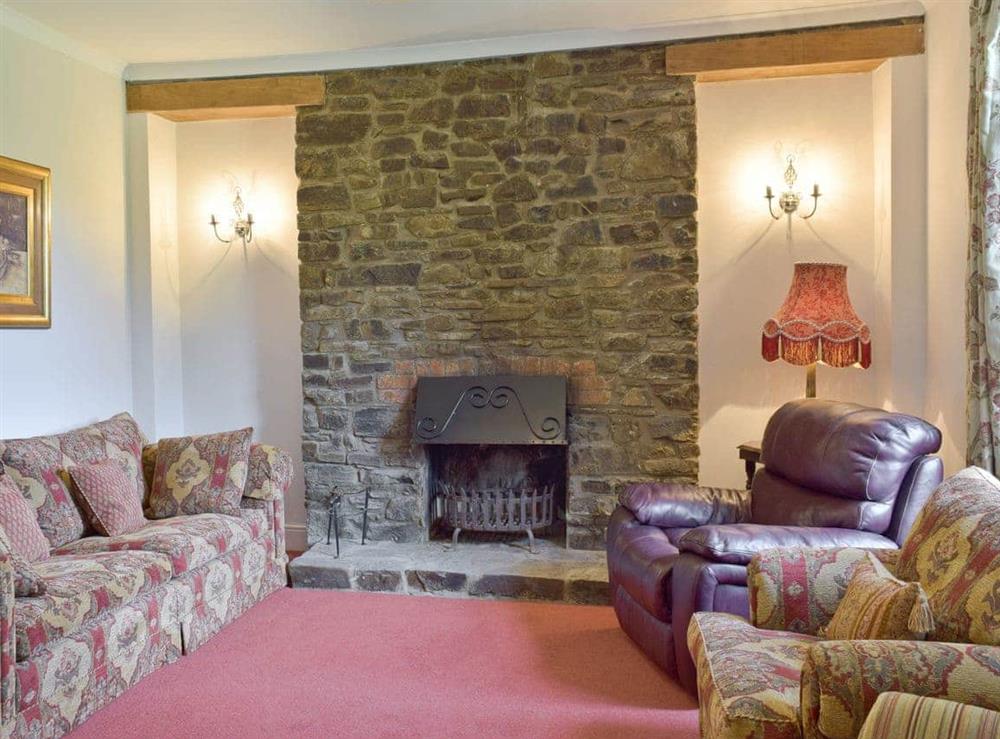 Second livening room with open fire at The Sycamores in Llawhaden, near Narberth, Dyfed