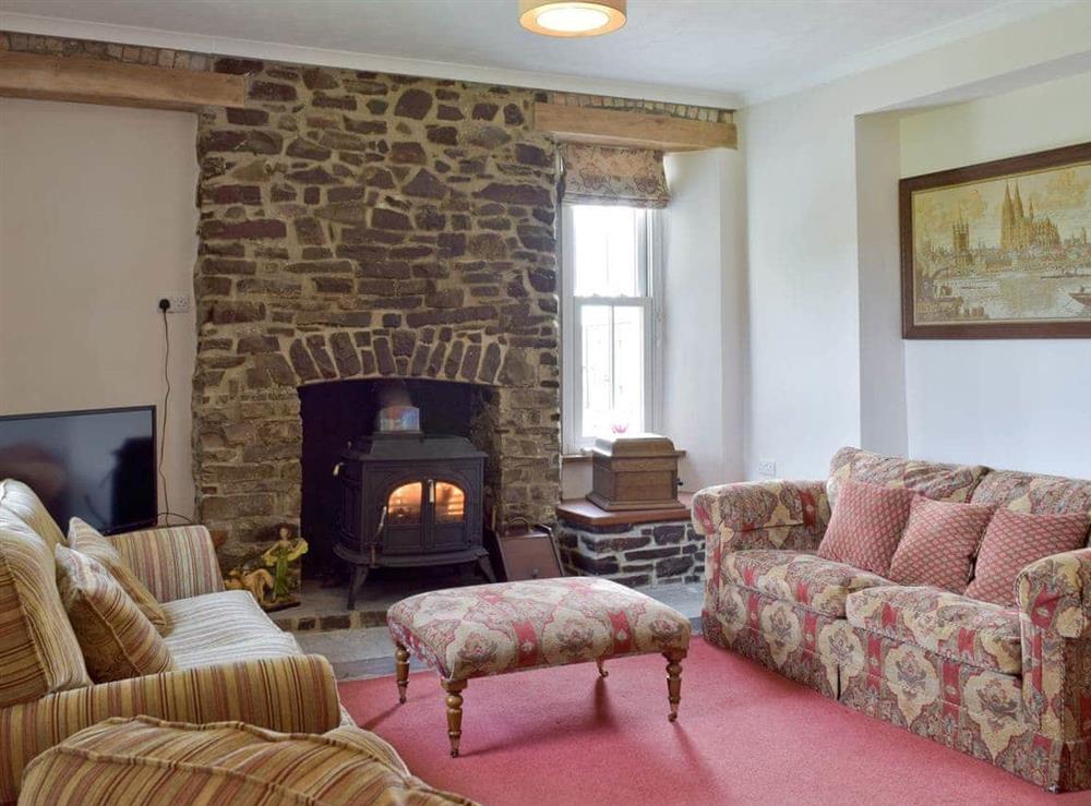 Spacious lounge with wood-burner at The Sycamores in Llawhaden, near Narberth, Dyfed