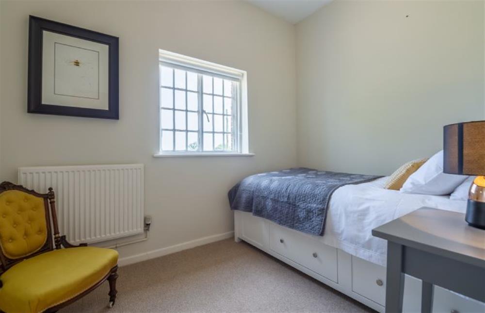 First floor: Bedroom three at The Tack House, Holkham near Wells-next-the-Sea