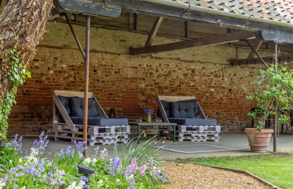 Loggia with seating at The Tack House, Holkham near Wells-next-the-Sea