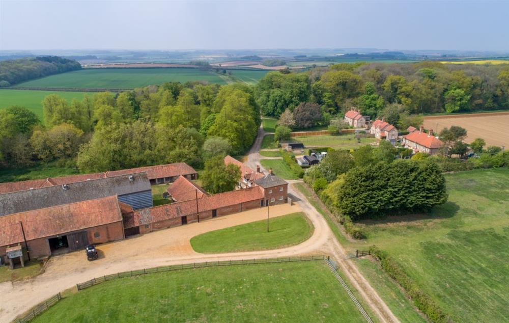 Aerial view with the coast in the distance at The Tack House, Near Holkham